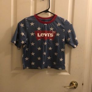 Levi’s blue shirt with white stars and red trim